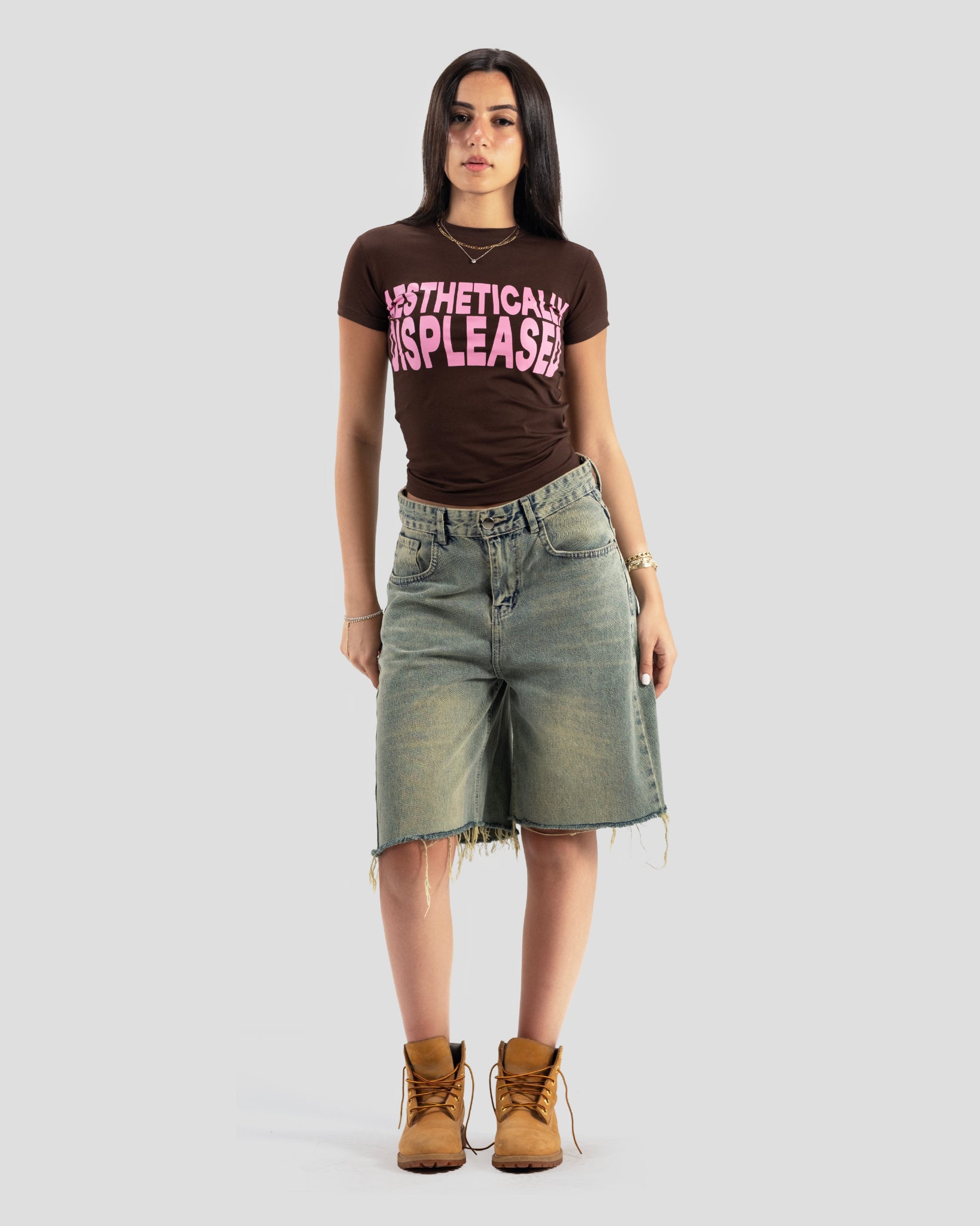 DISPLEASED BABY TEE BRWON